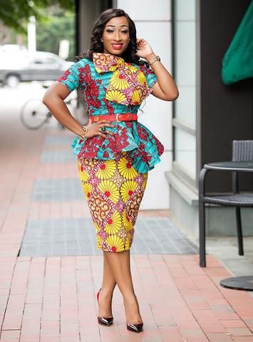 A fitted Ankara dress with a peplum waist and pencil skirt