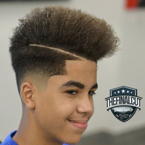 low skin fade side part pomp