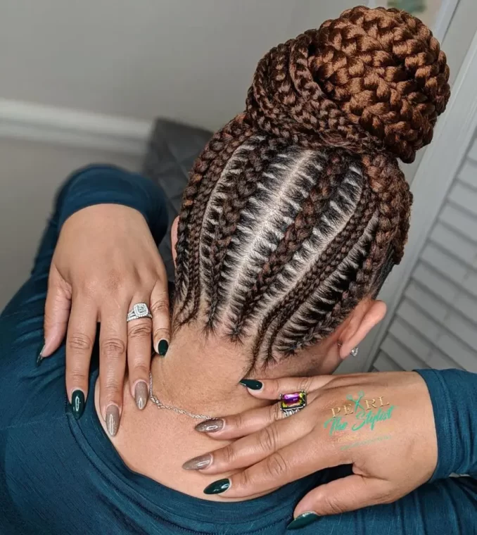 Brown Feed-In Cornrows with a High Bun