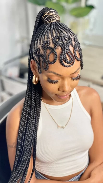 Looped Braids in a Half-Up, Half-Down Ponytail