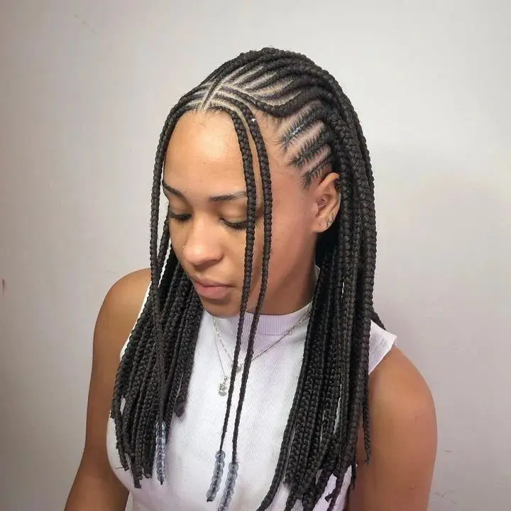 Neatly Parted Box Braids with Side Cornrows